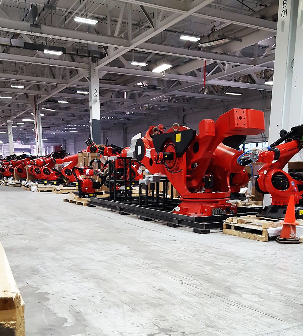 tesla kuka robotics model 3 automation