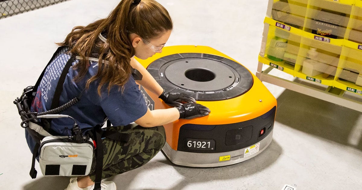 Amazon's in-house design firm came up with a vest that protects its warehouse workers from robots by making them slow down.