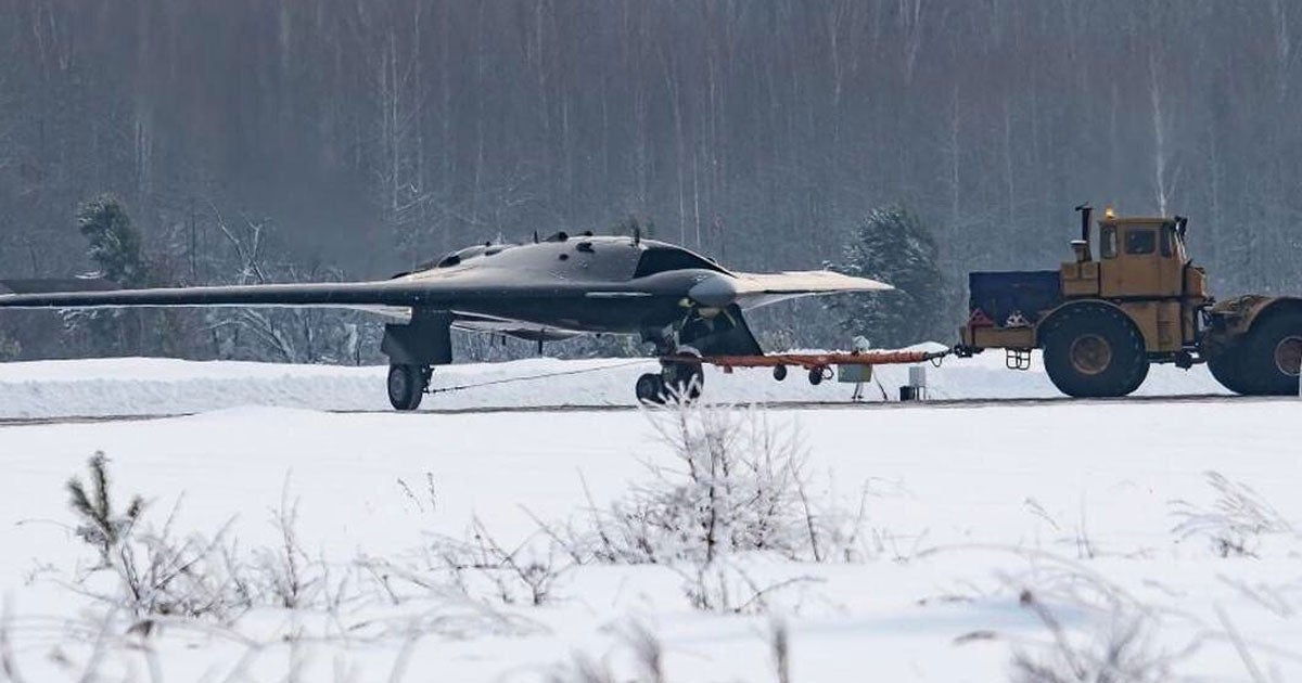 New images surfaced on Russian social media of what appears to be Russia's "Okhotnik" heavy strike drone seen at an unidentified runway.