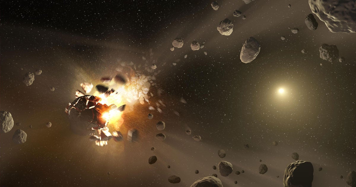 A catastrophic impact with a "Mars-sized planet" may have left behind the chemical building blocks that led to life on Earth.
