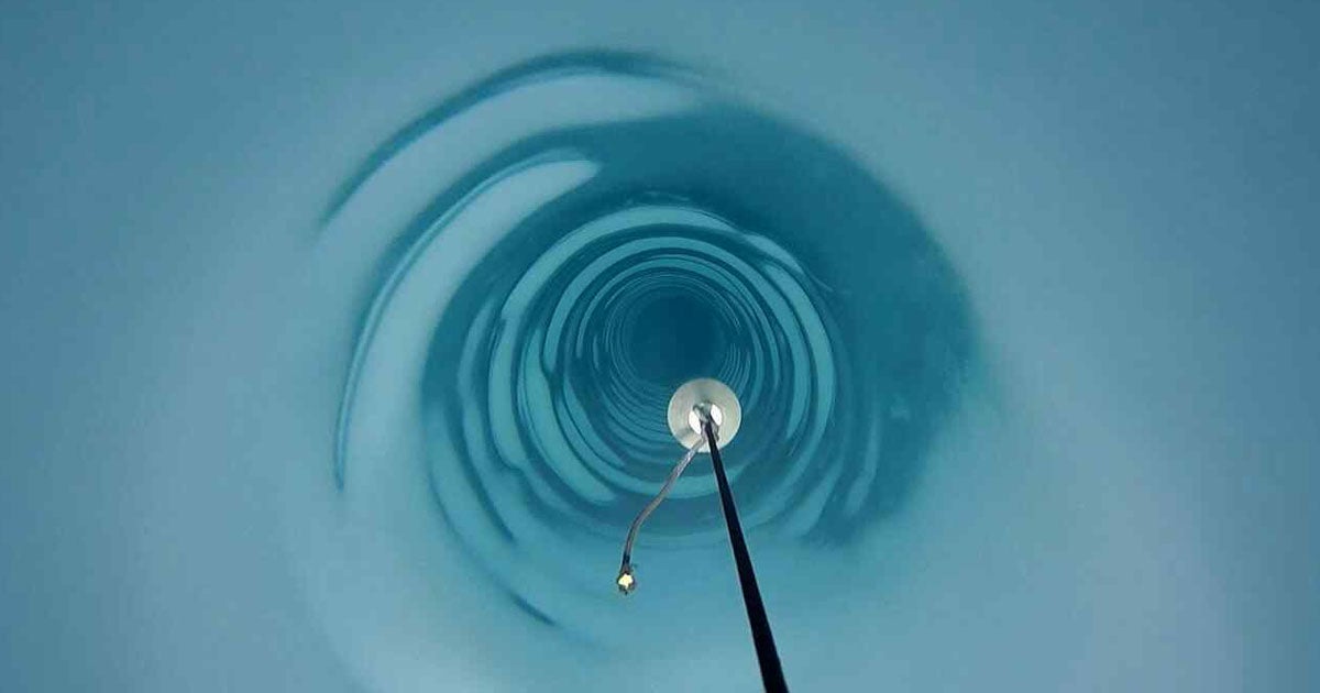 A team of scientists successfully drilled a hole, more than a mile in length, that went all the way through Antarctica's ice.
