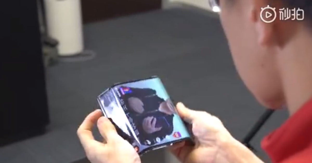 In a short clip, Xiamoi co-founder Lin Bin showed off the company's latest creation: a foldable smartphone that folds on both sides like an envelope.