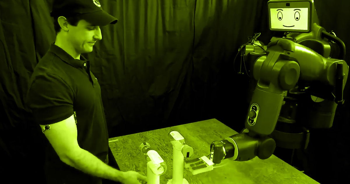 MIT's Baxter robot uses its ability to mimic human motions to tackle the viral #bottlecapchallenge in a decidely different way.