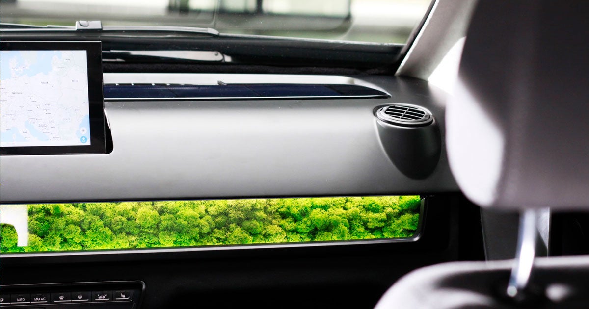 German startup Sono Motors has revealed a new solar-powered electric car with moss integrated into the vehicle's dashboard that help the car filter air.