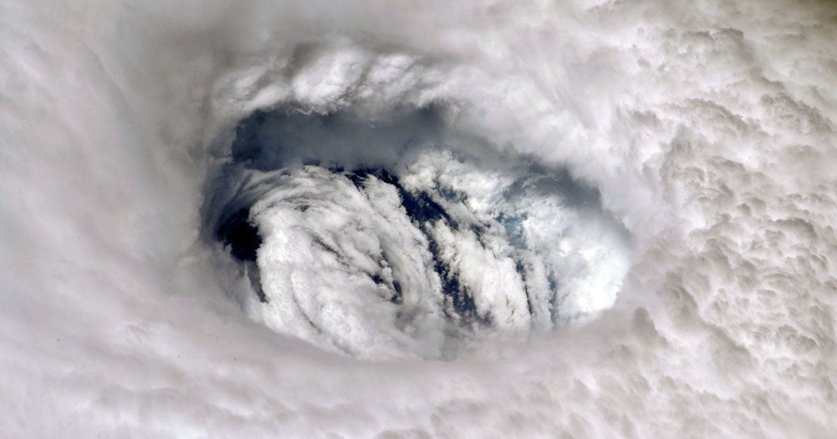 NASA astronauts Nick Hague and Christina Koch took to Twitter to share terrifying photos of Hurricane Dorian that they'd snapped from the ISS.