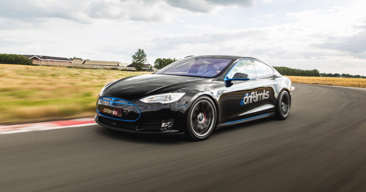 Elon Musk tweeted that the Tesla Model S set the record for the fastest 4 door ever at Laguna Seca in California challenging Porsche's electric sports car.