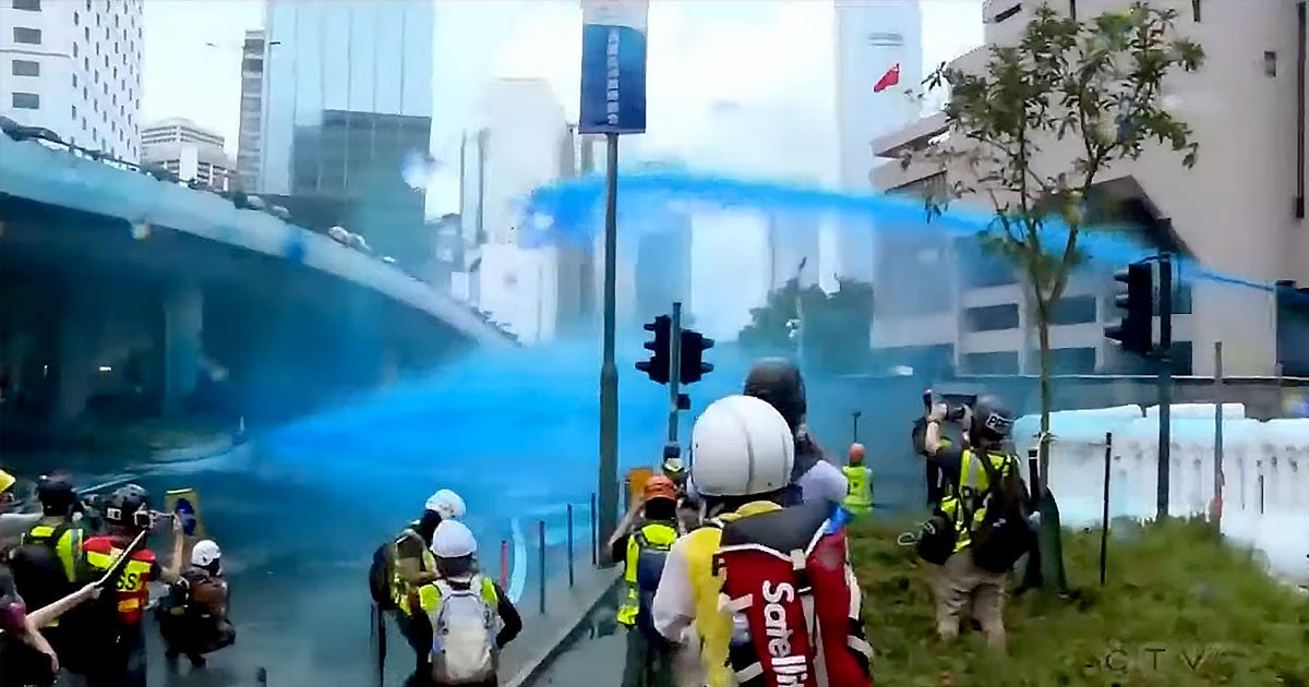 Authorities in Hong Kong are spraying crowds of protestors with canons full of blue dye to make them easy to identify for later arrest.