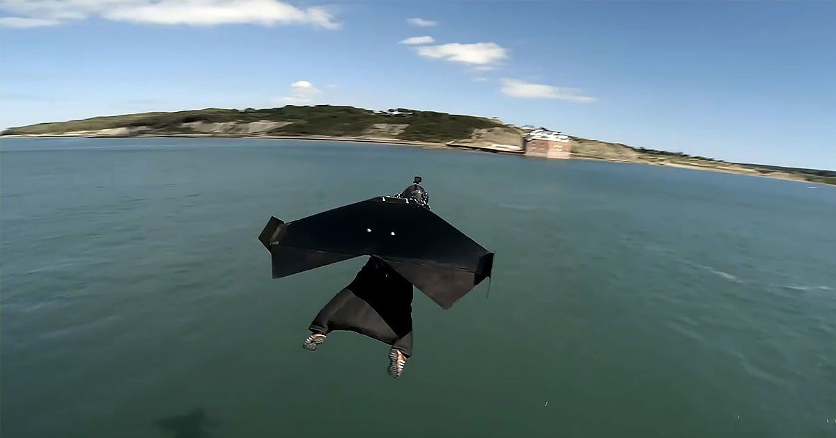Inventor Richard Browning donned his Iron Man-style jet suit to deliver a letter to the Isle of Wight — and broke a personal flight record in the process.