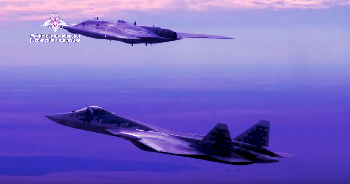 The video uploaded by the Russia Defense Ministry shows the unusual combat drone aircraft take off next to a Russian S-57 advanced combat jet.
