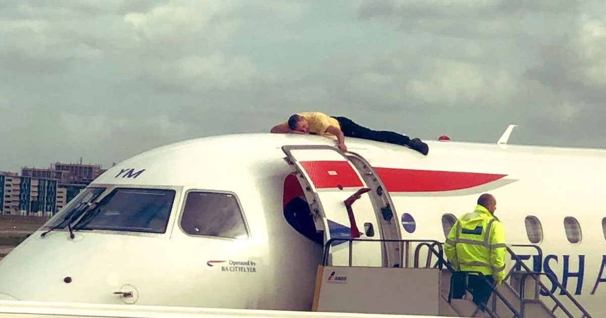 In an unusual stunt, former Paralympian and bronze medal winner James Brown glued himself to the top of a British Airways plane at a London airport.