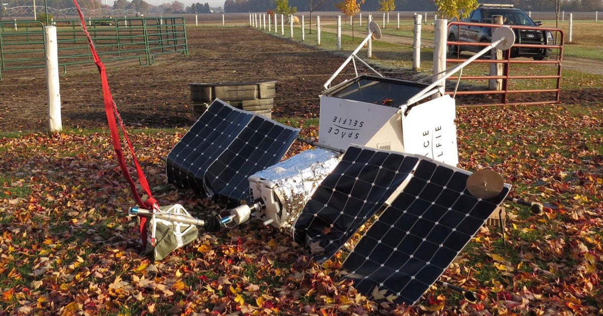 A Samsung "SpaceSelfie" satellite came crashing down to Earth, landing onto an unsuspecting Michigan farm below, NBC reports.