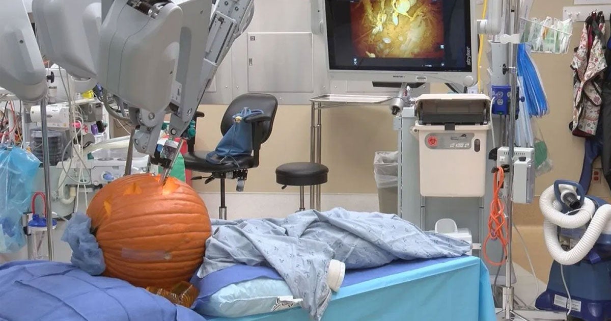 A team of surgeons from Charlotte, North Carolina have demonstrated new surgery robot technology by carving a jack-o-lantern and removing its seeds.