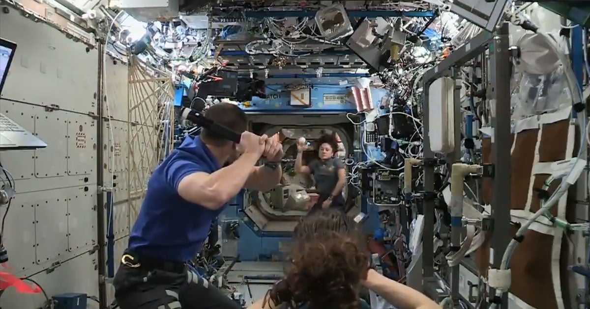 Astronauts on the International Space Station played a quick game of low-gravity baseball in orbit to promote the World Series.