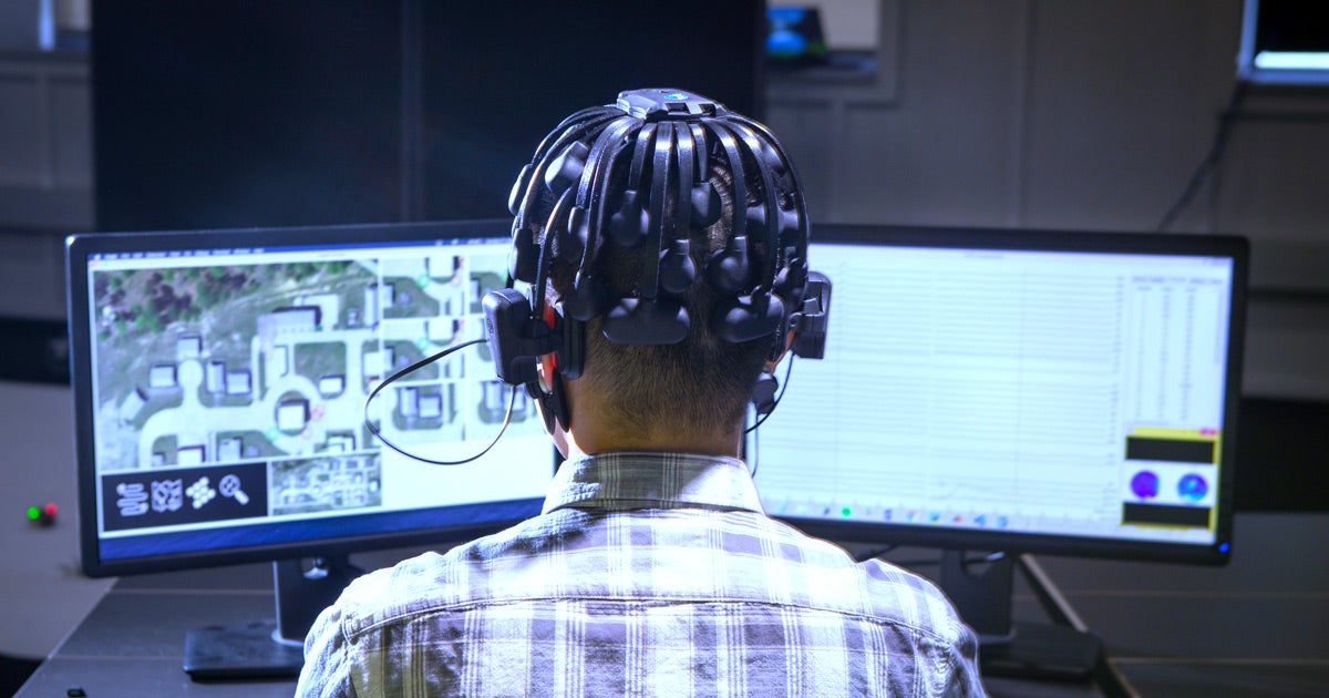 Artificial intelligence researchers are studying the brain waves and eye movements of gamers to train an AI that can control fleets of military robots.
