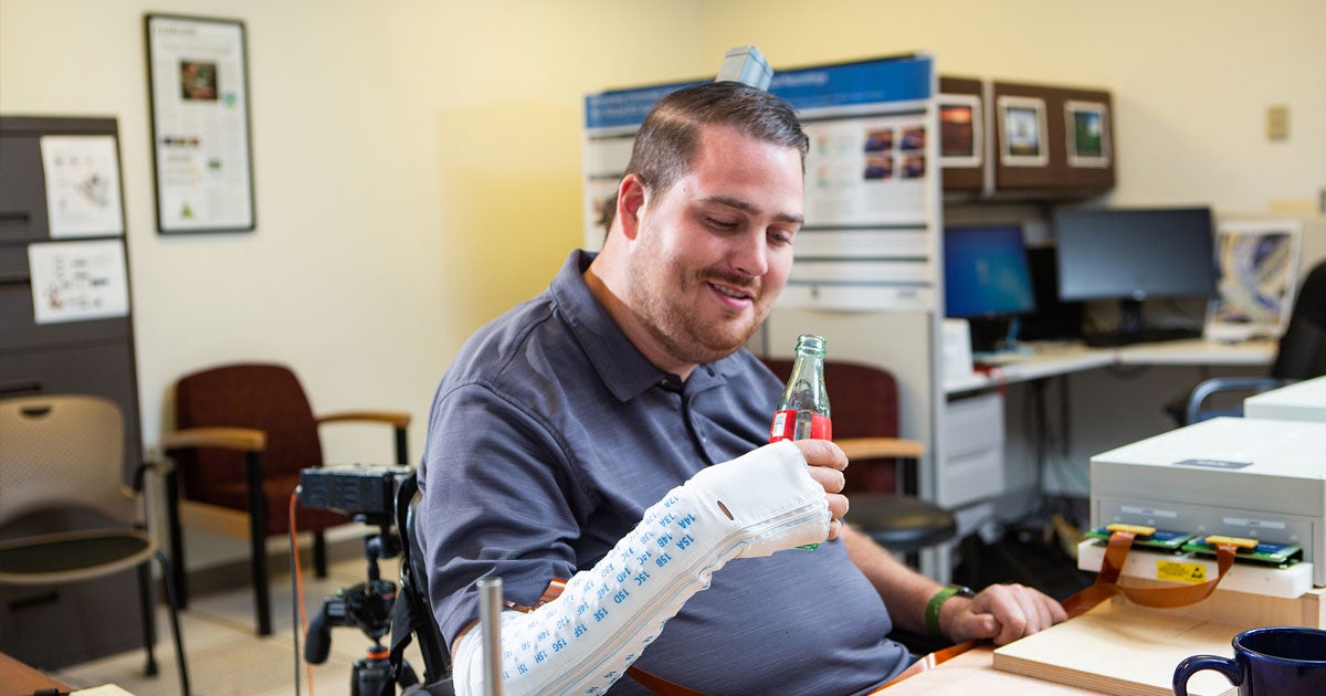 Technology developed by a nonprofit specializing in medical tech has allowed a man to feel and move his hand again after a spinal chord injury.