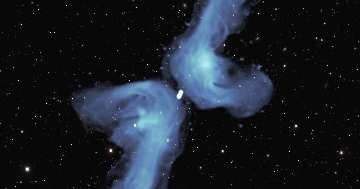 A team of astronomers claim they have solved the mystery behind why some highly active galaxies have four jets of radio waves, forming an X.