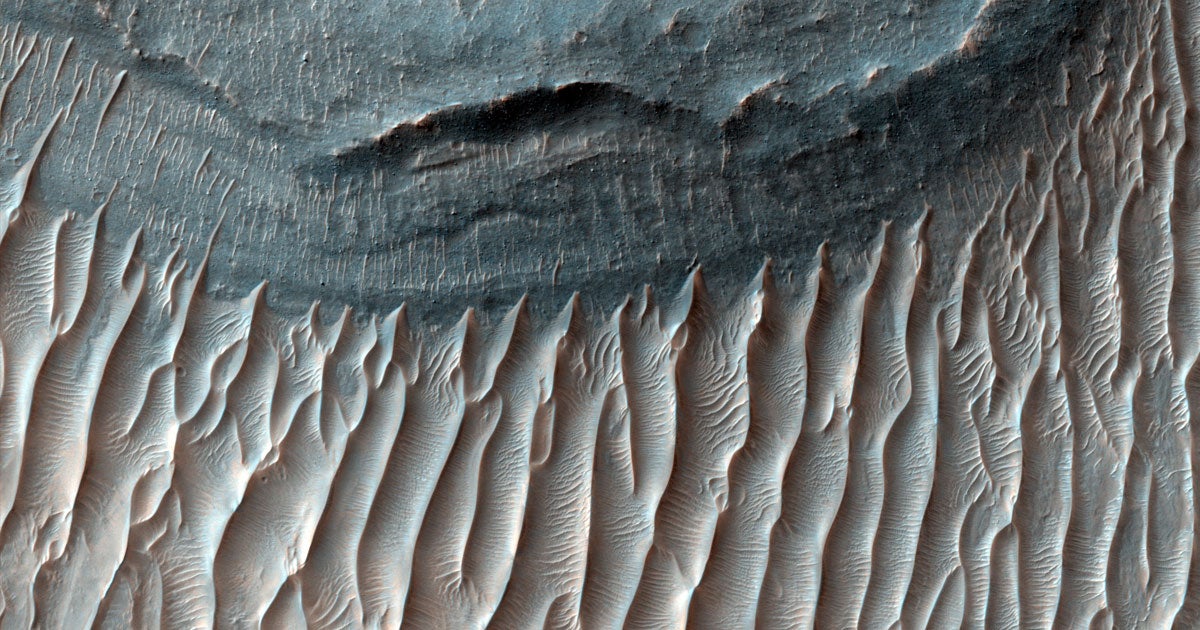 Researchers have found evidence of gigantic waves of sand, often referred to as "megaripples," slowly moving around on the surface of Mars.