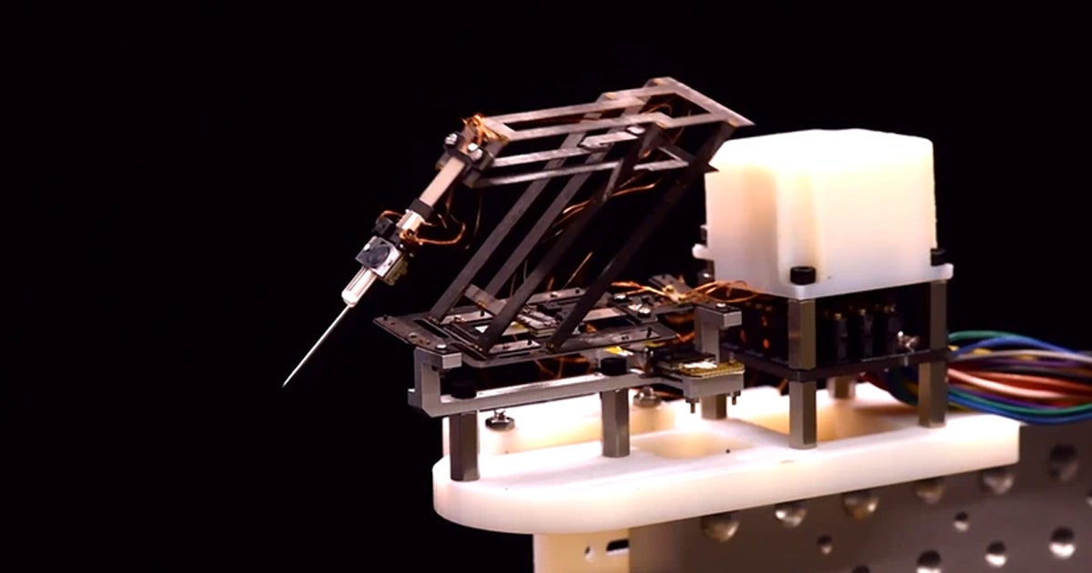 Researchers at Harvard built a tiny microscale surgical robot, only about the size of a tennis ball, which was inspired by origami.