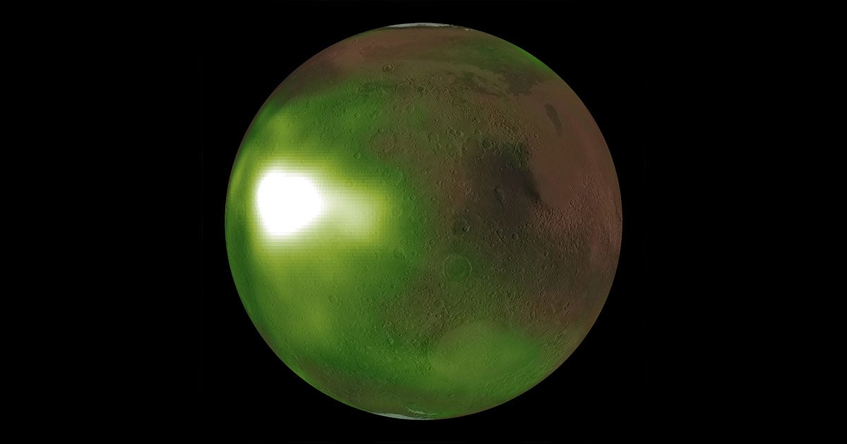 A new NASA simulation shows the ghostly ultraviolet flashes of Mars's "nightglow," represented by greenish hues in the Martian night sky.
