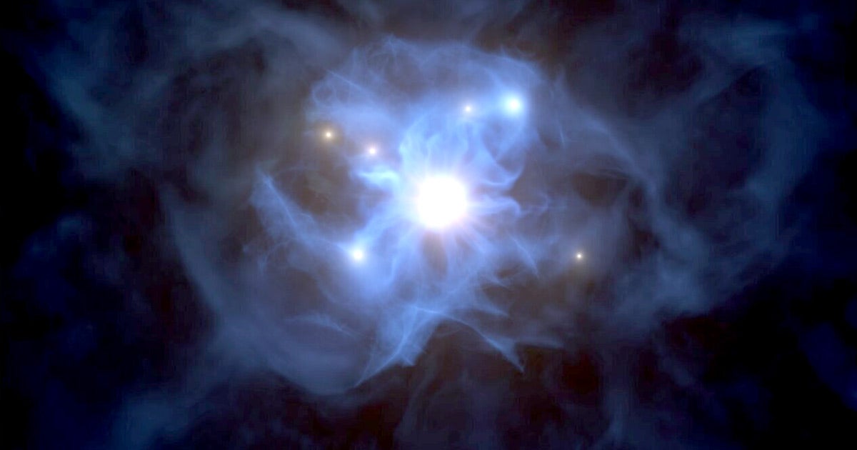 Astronomers found a supermassive black hole slowly feasting on galaxies trapped nearby when the universe was still under a billion years old.