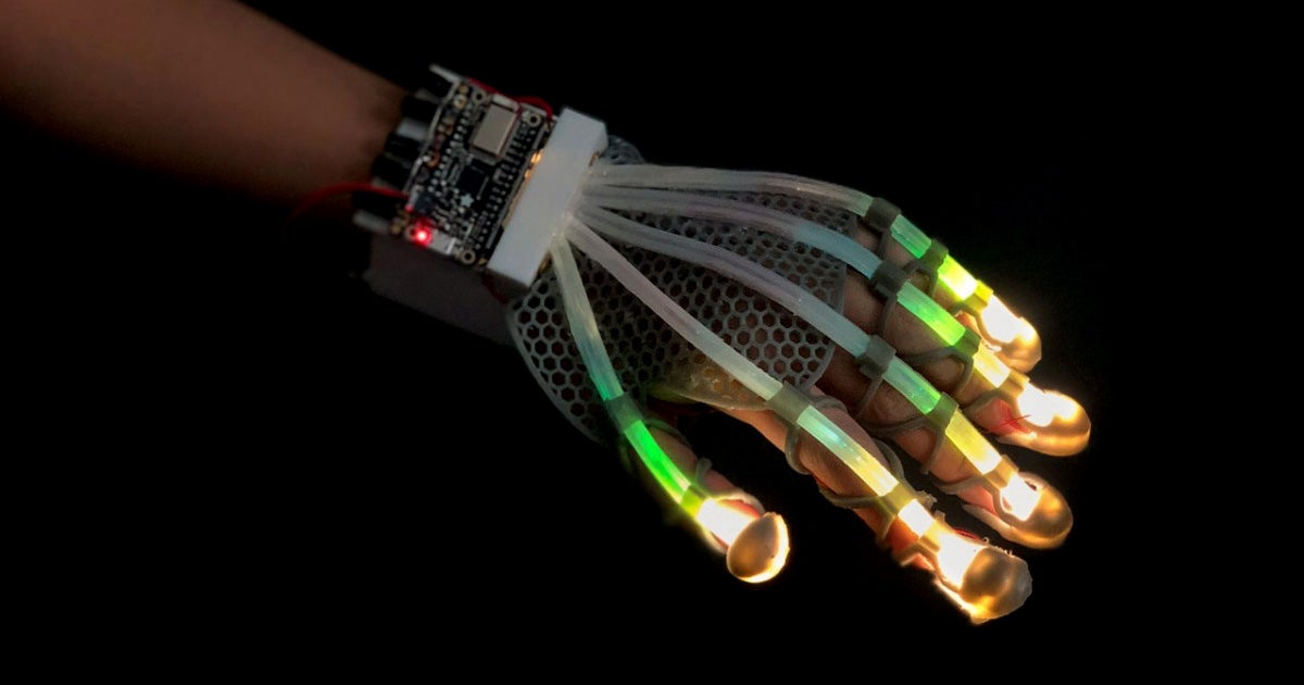 A team of scientists at Cornell University has created a stretchable fiber-optic sensor that could give robots and virtual reality a "human touch."