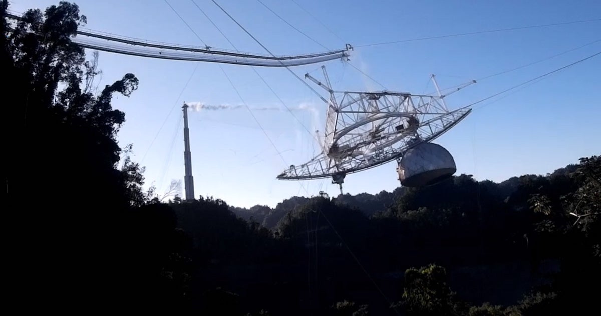 Newly released footage, including several drone shots, shows the Arecibo Observatory in Puerto Rico collapsing in on itself.