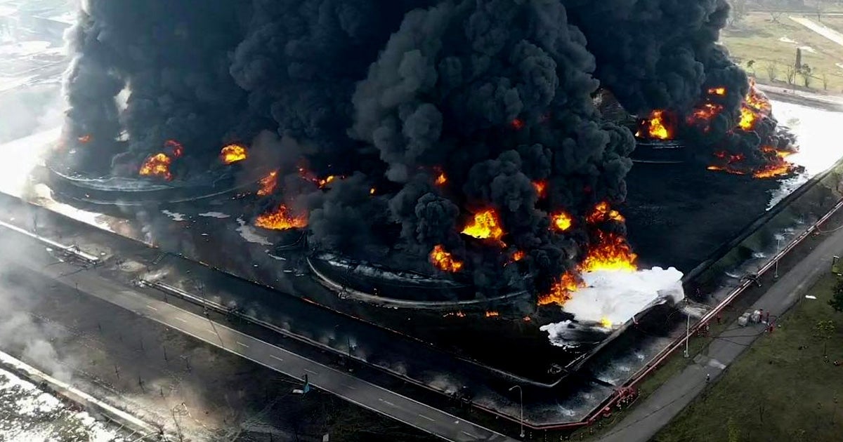 An Indonesian oil refinery on the island of Java caught on fire early Monday, ballooning into a massive column of fire and smoke. 