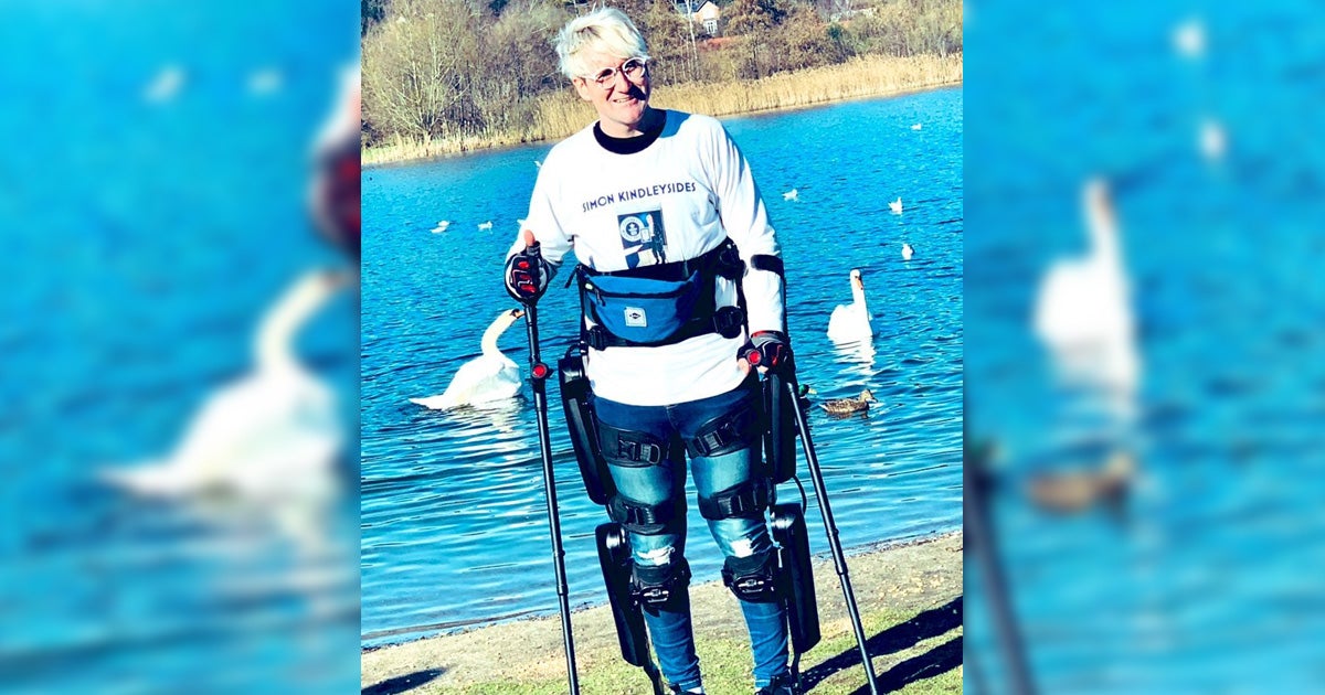 Simon Kindleysides, who's paralyzed from the waist down, walked over 100 miles in a powered exoskeleton during February to raise money for the NHS.