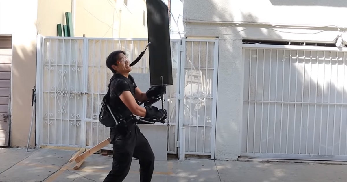 Only a YouTube inventor would buy an exoskeleton just to lift a massive 50 pound sword modeled after one found in the hit video game "Final Fantasy VII."