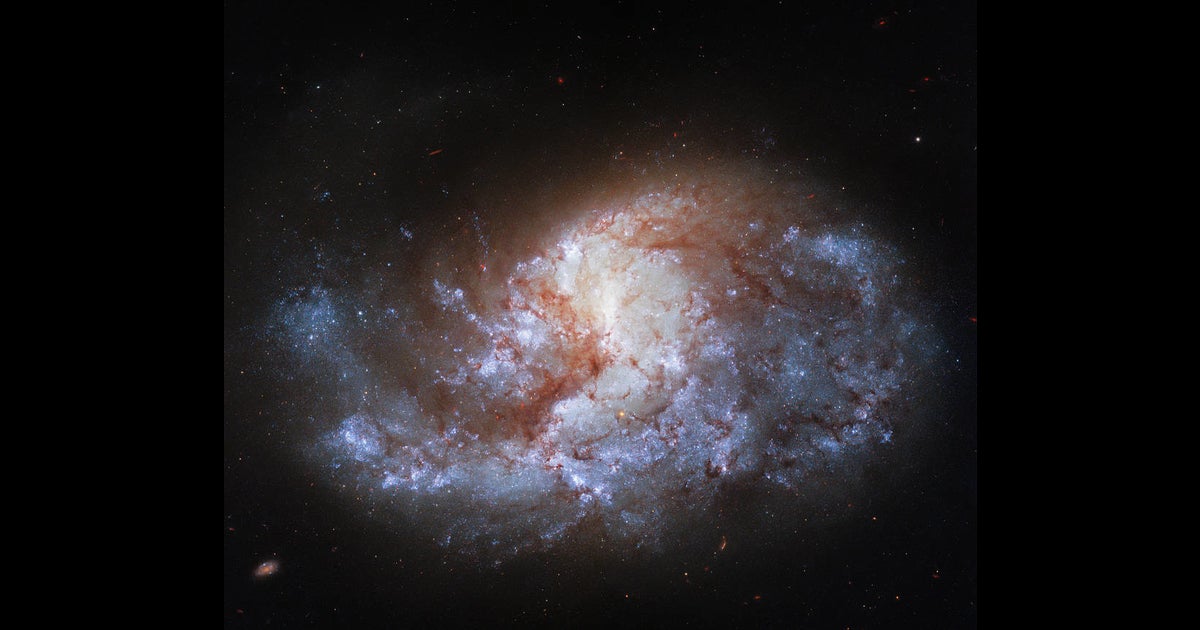 NASA released a stunning image taken by the Hubble Space Telescope depicting a spiral galaxy 68 million light-years away from Earth.