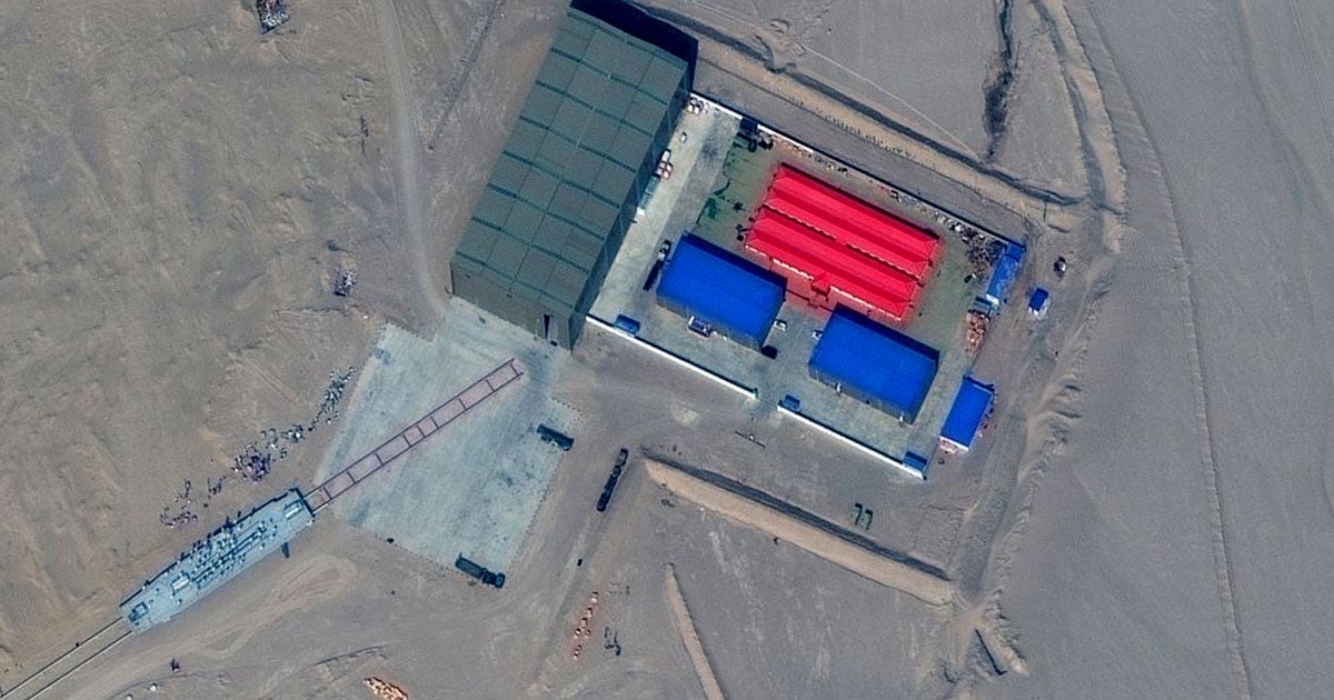 China's military has built mockups of US Navy aircraft carriers and other warships, seemingly in order to use them as target practice, Reuters reports. 