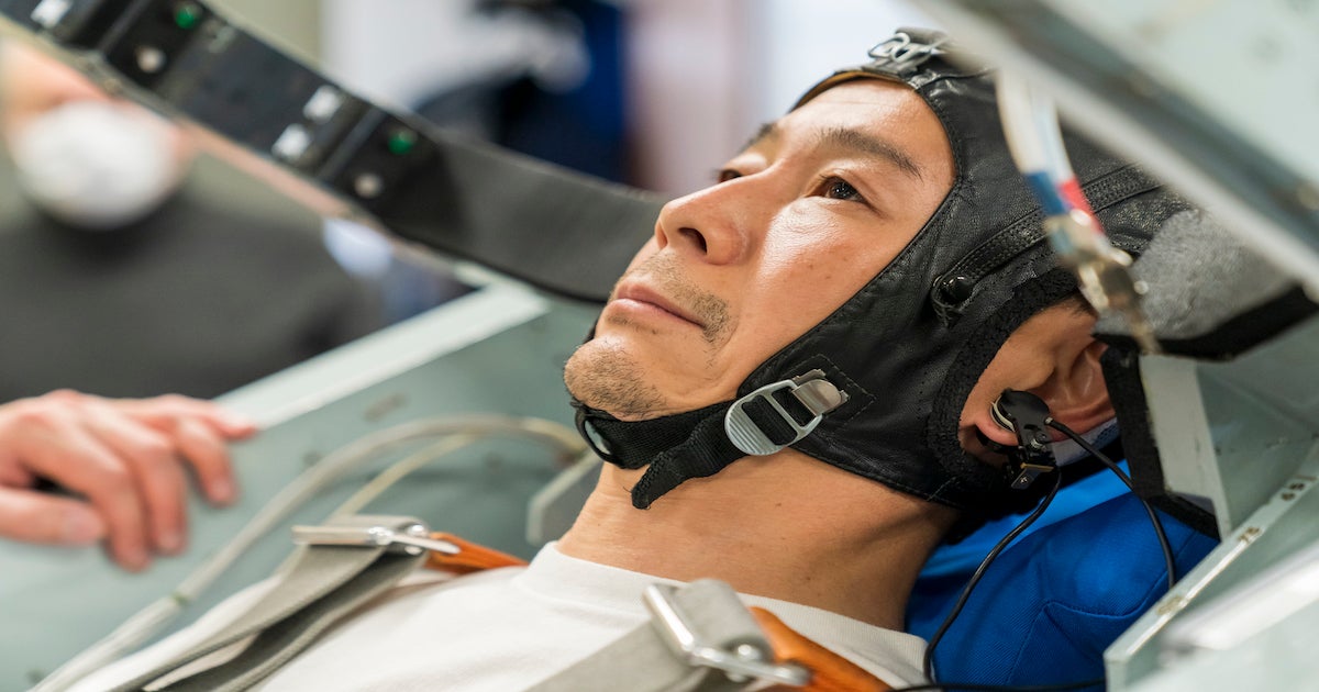 Japanese billionaire Yusaku Maezawa arrived at the International Space Station, where he'll give away money to the public and share videos on YouTube.