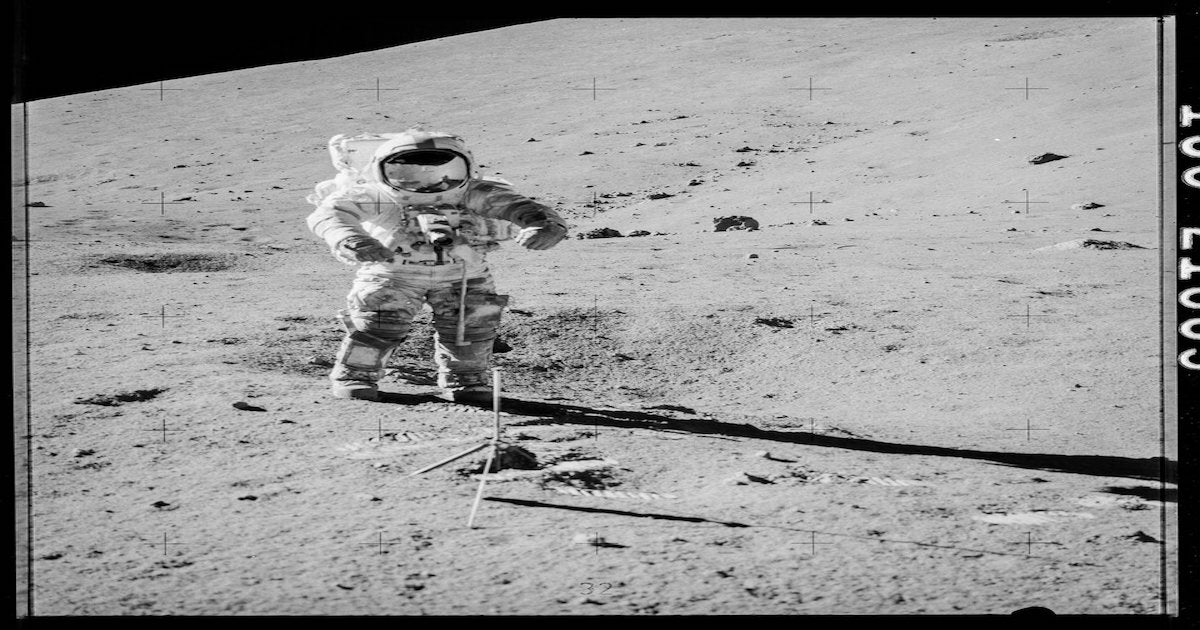 A team is ready to open a Moon soil container from the 1972 Apollo 17 mission. The opening will allow the extraction of precious lunar gases for testing.