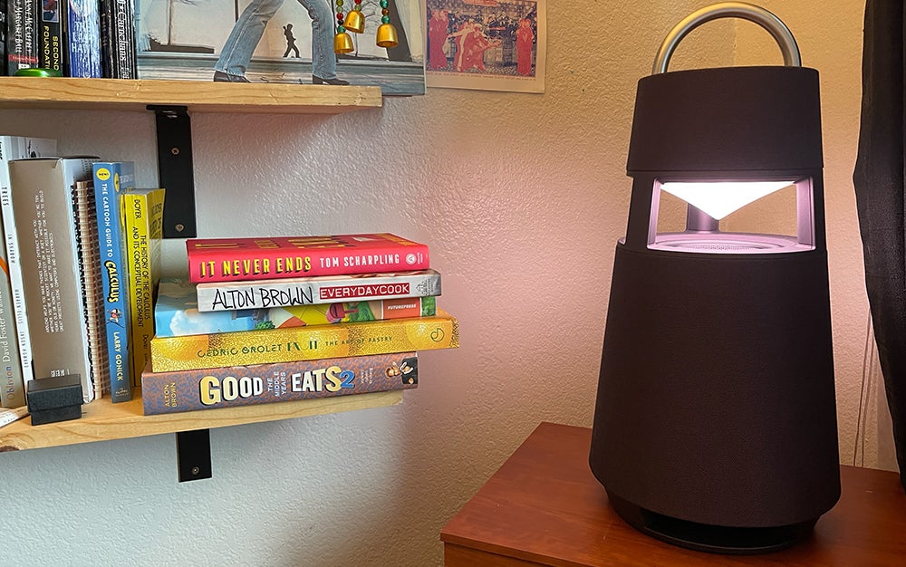 LG XBOOM 360 in a reading nook showing off Ambient light mode.