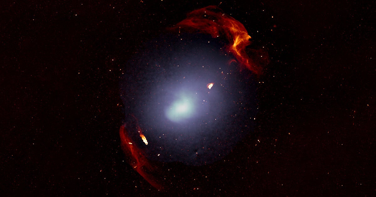 Two gigantic clusters of galaxies smashed into each other around a billion years ago — and the collision's shockwaves spread so far that they absolutely dwarf our own galaxy.