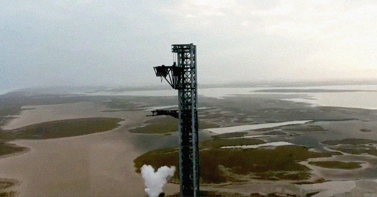 SpaceX has hooked up the pair of massive "chopsticks" of its 460-foot "Mechazilla" tower to its latest Starship prototype dubbed Ship 20.