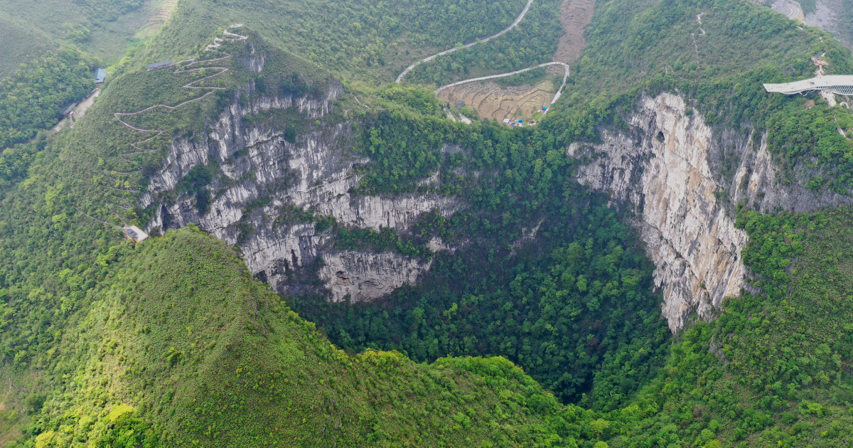 Explorerers in China found a massive sinkhole that has an entire ancient forest inside. It could hold species previously not discovered.