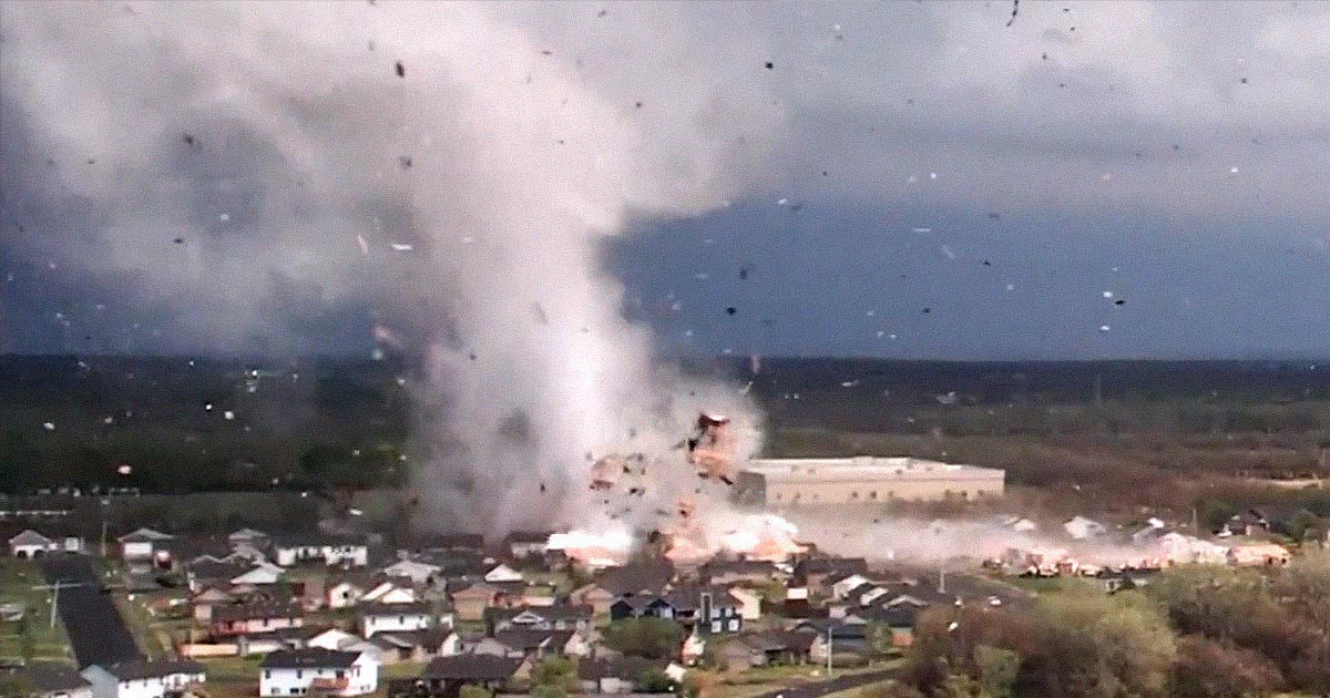 Terrifying new drone footage shows a massive tornado leaving a devastating trail of debris behind in Andover, Kansas.