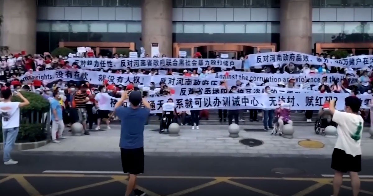 Protestors gathered at a major bank in China on Sunday, looking to reclaim government-frozen personal funds — only to face brutality by security forces.
