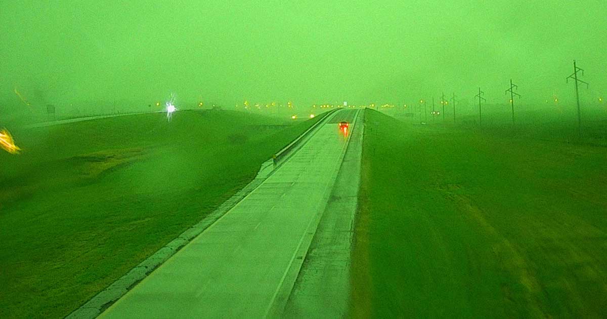 Before yesterday's powerful derecho storm, the sky in Sioux Falls, South Dakota turned an eery shade of Powerade-colored neon green.