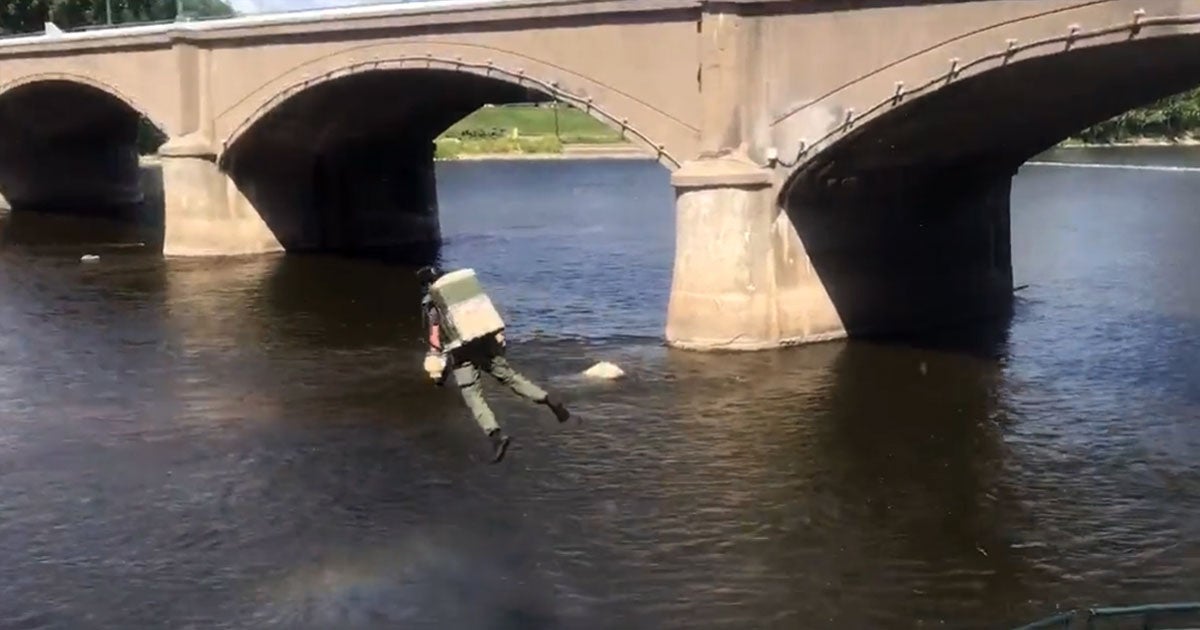 Residents in downtown Grand Rapids, Michigan, were shocked to see a man wearing a jetsuit blast over the city's river and even dive through a bridge.