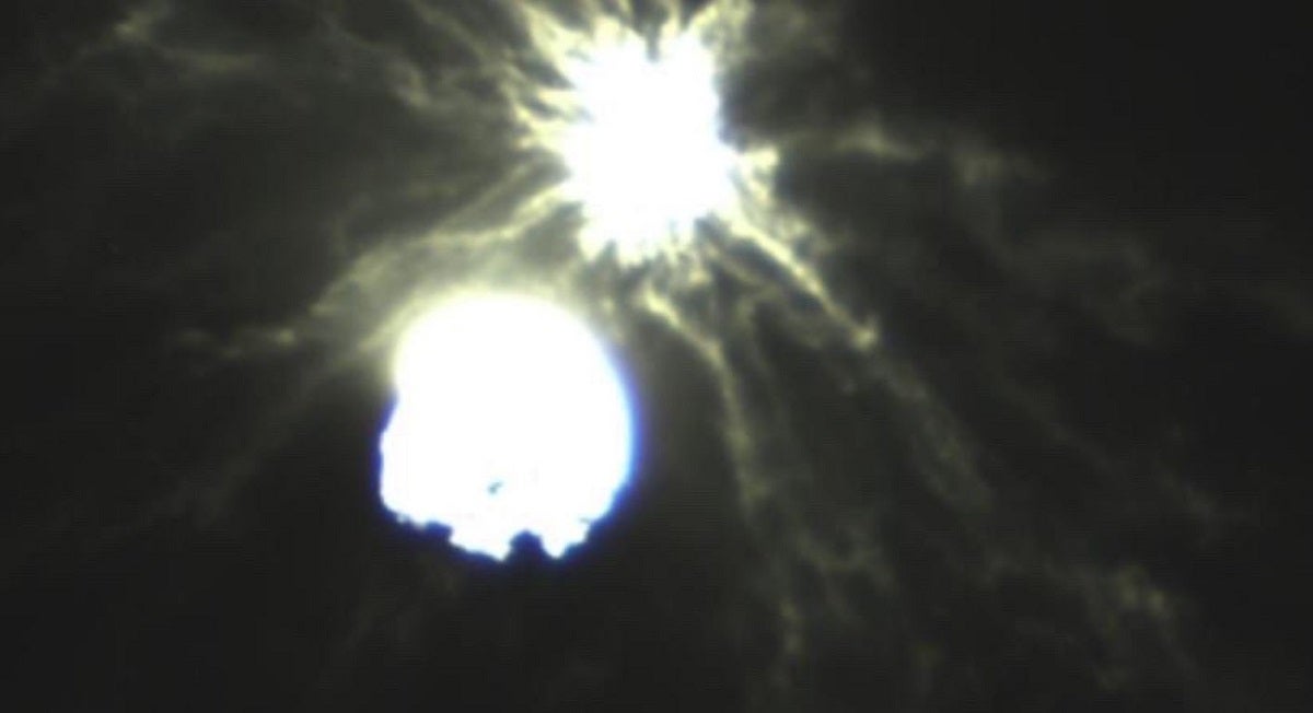 New photos show exactly how big of a chunk NASA's asteroid battering ram took out of a flying space rock yesterday in its DART mission.