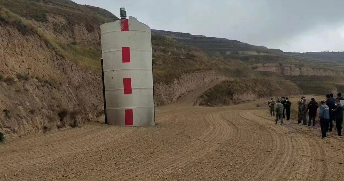A gigantic piece of a Chinese Long March 2D rocket has seemingly plummeted back down to Earth and lodged itself in a crop in the province of Gansu.
