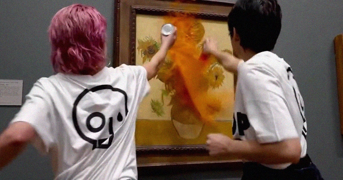 A shocking new video shows two climate activists throwing a can of soup at Vincent van Gogh's famous "Sunflowers" painting at London's National Gallery.