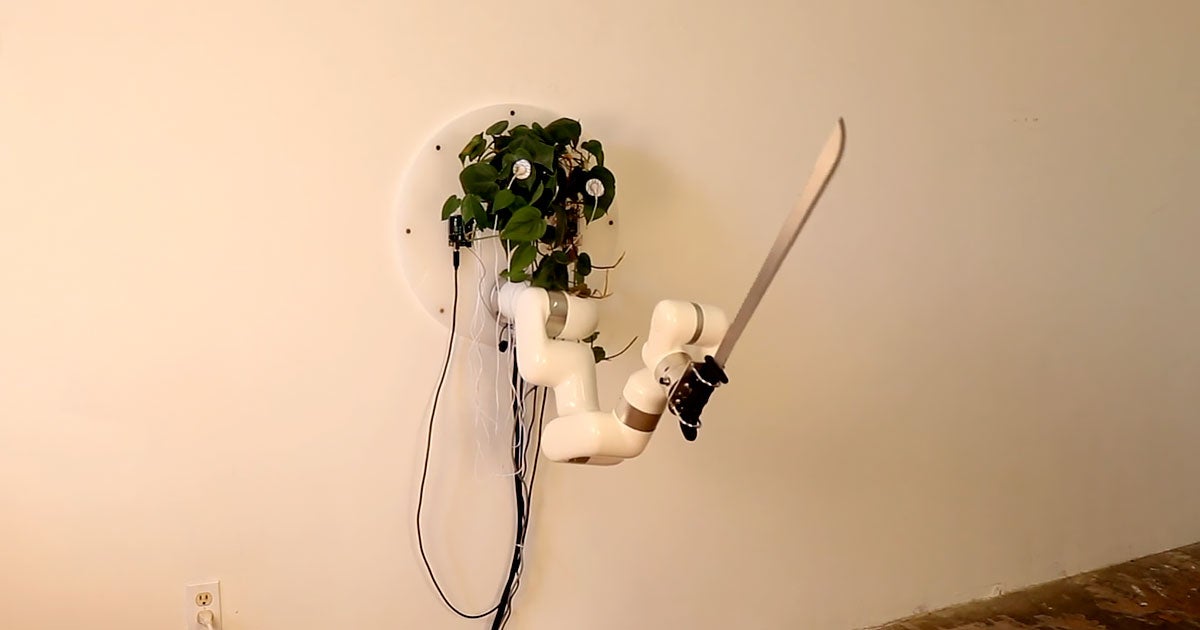 What if you gave a plant control of a robotic arm and then gave that robotic arm a machete? That seems to be the idea behind the "Plant Machete" project.