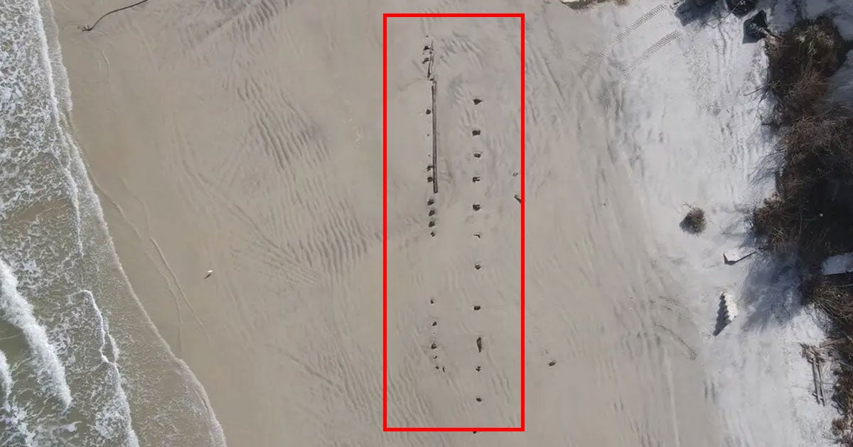 Beach erosion caused by Hurricane Nicole and Ian has caused a massive mysterious object to poke out of the sand at Daytona Beach Shores in Florida.