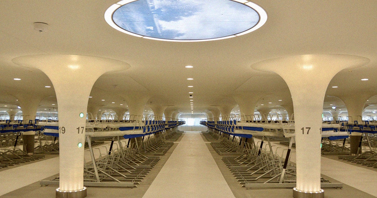 The city of Amsterdam just unveiled an underwater bike parking garage for the city's cyclers. It's beautiful, efficient, and further disincentives cars.