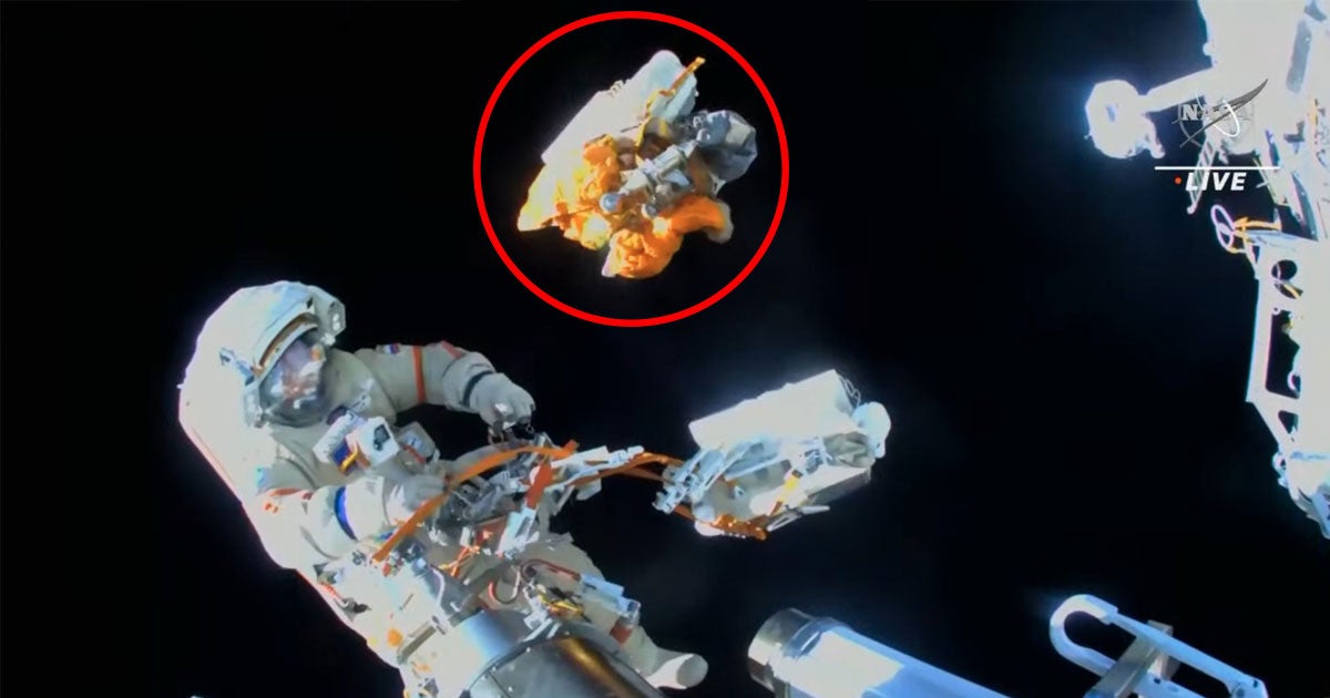 After completing a seven-hour spacewalk, two Russian cosmonauts intentionally left a bundle of discarded hardware drift away into empty space.