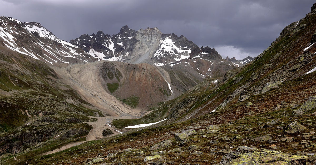 A part of the summit of a mountain in the Alps has collapsed, the likely result of permafrost thawing, dramatic footage shows.