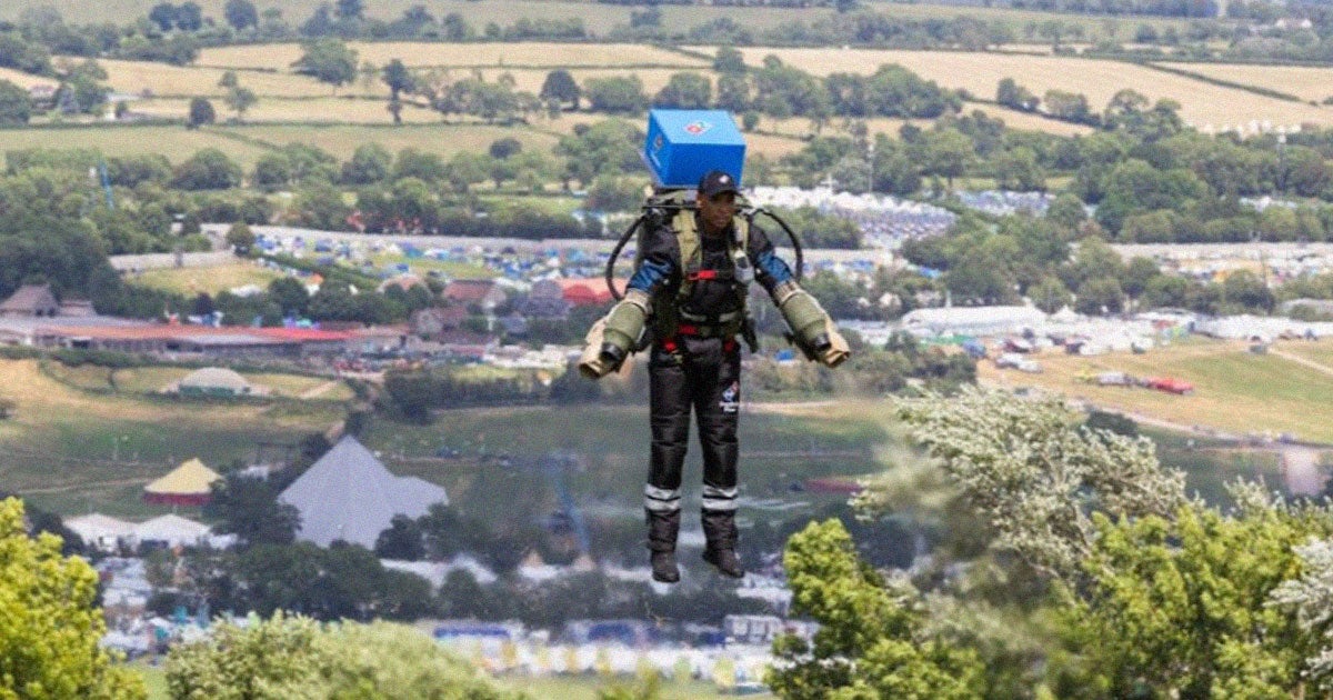 For what's believed to be the first time, a pizza was delivered by jetpack. The delivery was made by Domino's at the Glastonbury festival.